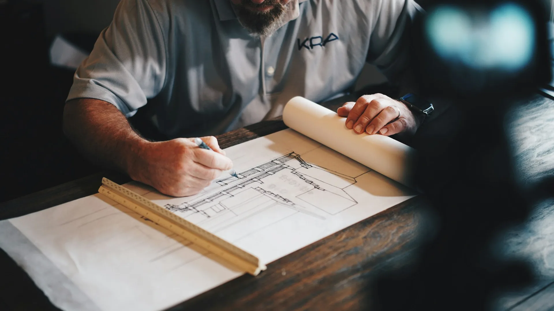Marking up a drawing set on a site table